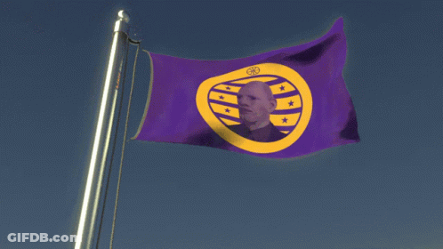 A Purple And Yellow Flag With A Picture Of A Man In The Middle GIF