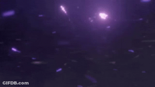 A Purple Background With A Glowing Light In The Center GIF