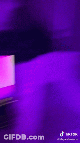 A Purple Background With A Tiktok Logo On The Bottom Right Corner GIF