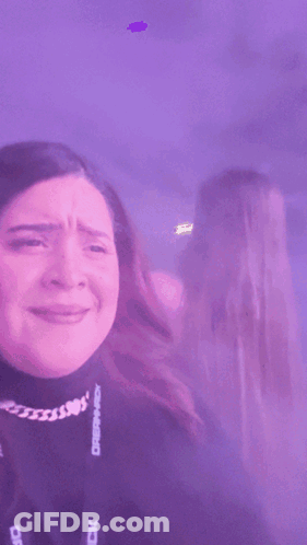A Purple Background With A Woman And The Words It 'S Shagarita GIF