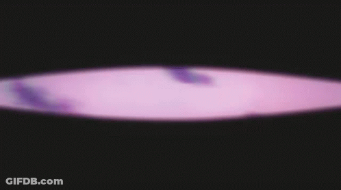 A Purple Background With Clouds In The Sky GIF
