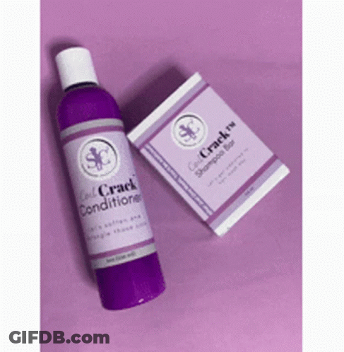 A Purple Bottle Of Conditioner And A Purple Box Of Shampoo Are Sitting On A Purple Surface . GIF