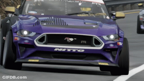 A Purple Car With The Word Nitto On The Front Of It GIF