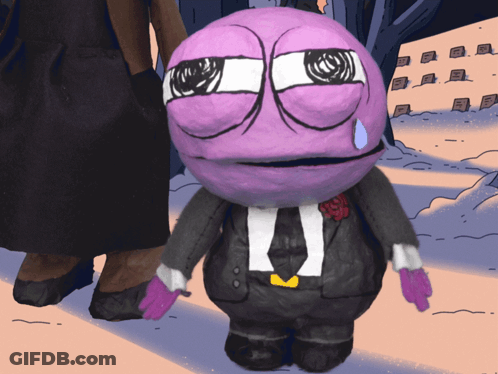 A Purple Cartoon Character In A Suit And Tie With A Tear Running Down His Face GIF
