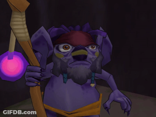 A Purple Cartoon Character With A Beard Holding A Stick GIF