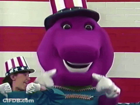 A Purple Dinosaur Is Wearing An Uncle Sam Hat And Giving A Thumbs Up While Standing Next To A Woman . GIF