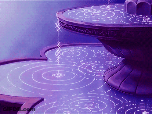 A Purple Fountain With Circles On The Floor GIF