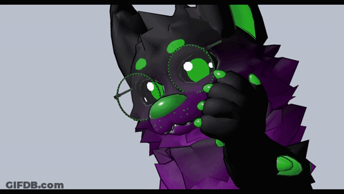 A Purple Furry Animal With Green Eyes And The Words " It 'S Free " On The Bottom GIF