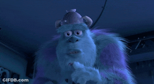A Purple Furry Monster With A Pink Hat On GIF