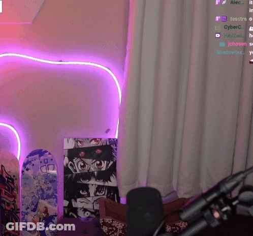 A Purple Heart Shaped Light Is Lit Up In A Room With Skateboards On The Floor GIF