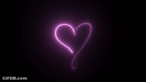 A Purple Heart With A Swirl In The Middle On A Black Background GIF