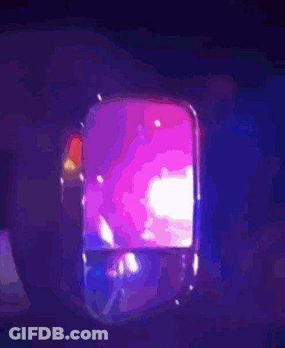 A Purple Light Is Shining On A Person 'S Head GIF