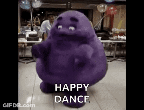 A Purple Monster Is Dancing In A Room With The Words Happy Dance Below It GIF