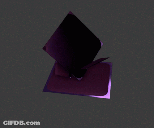 A Purple Object Is Floating In The Air Against A Dark Background GIF
