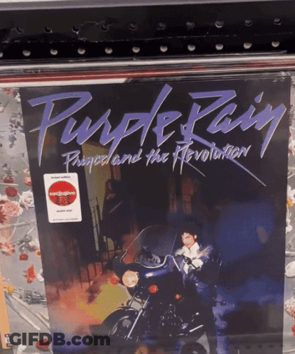 A Purple Rain Album Cover With A Man On A Motorcycle On It GIF