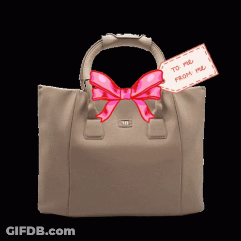 A Purse With A Label That Says To Me From Me GIF