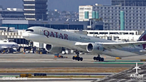 A Qatar Airlines Plane Is On The Runway GIF