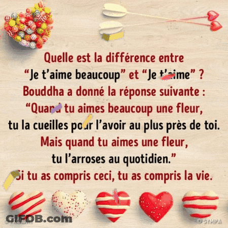 A Quote In French With Hearts And Lollipops On A Wooden Table GIF