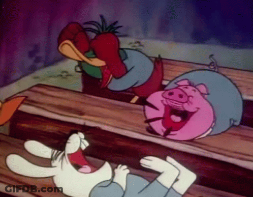 A Rabbit , A Pig And A Duck Are Laughing Together On A Wooden Bench . GIF