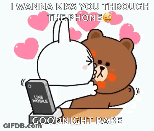 A Rabbit And A Bear Are Kissing Each Other While Looking At A Cell Phone . GIF