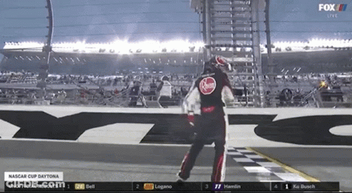 A Race Car Driver Celebrates Winning The Nascar Cup Daytona GIF