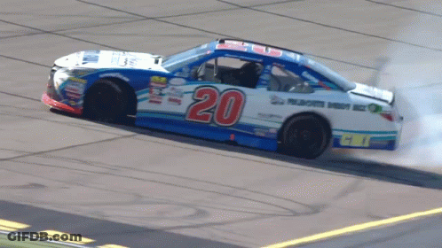 A Race Car Has The Number 20 On The Side GIF