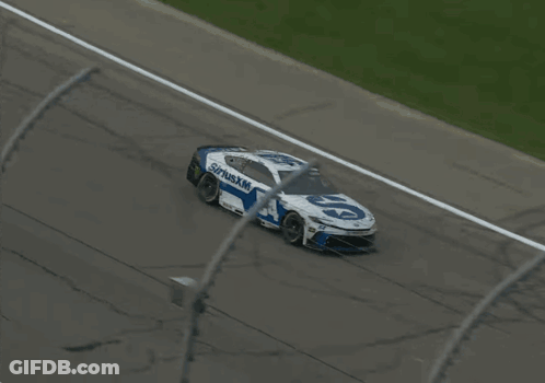 A Race Car With Siriusxm 54 On The Side Of It GIF