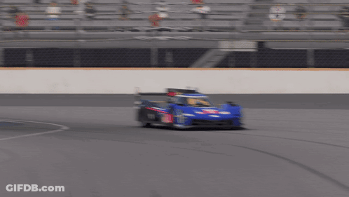 A Race Car With The Number 1 On The Side Of It GIF