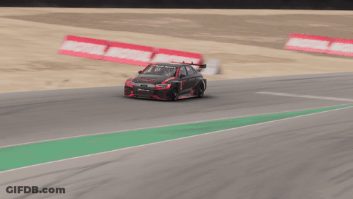 A Race Car With The Number 1 On The Side Of It GIF