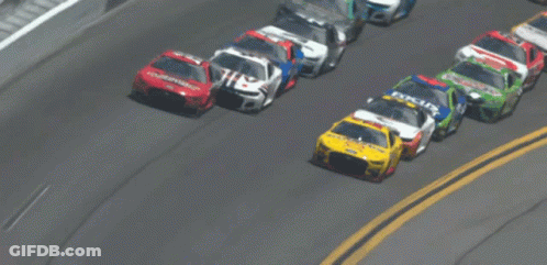 A Race Car With The Number 14 On It GIF