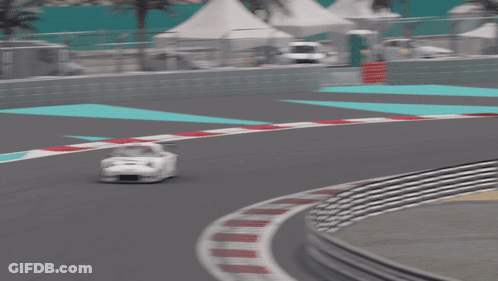 A Race Car With The Number 21 On The Side GIF