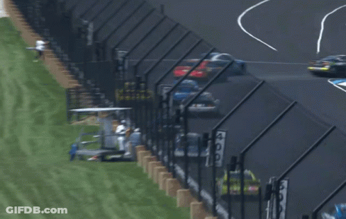 A Race Car With The Number 22 On The Side GIF