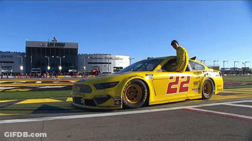 A Race Car With The Number 22 On The Side GIF
