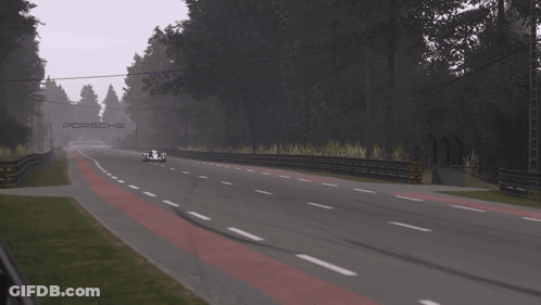 A Race Car With The Number 3 On The Side Of It GIF