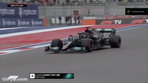 A Race Car With The Number 44 On The Front GIF