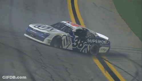 A Race Car With The Number 53 On The Side Of It GIF