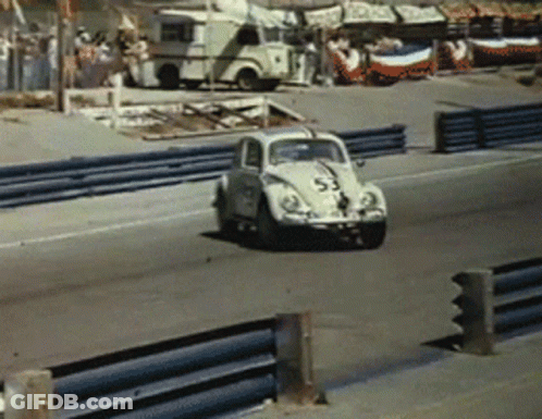A Race Car With The Number 55 On The Side GIF