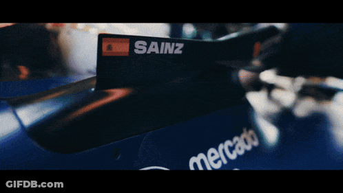 A Race Car With The Number 55 Painted On It GIF