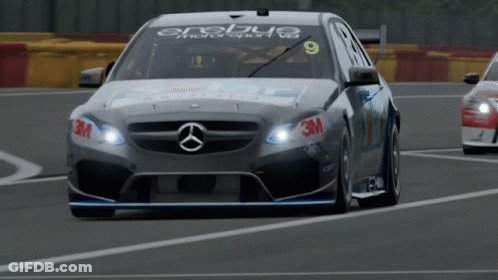 A Race Car With The Number 9 On The Side GIF