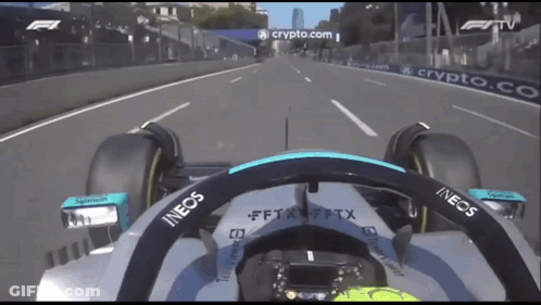 A Race Car With The Word Ineos On It GIF