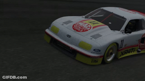 A Race Car With The Word Quality Tools On The Front GIF