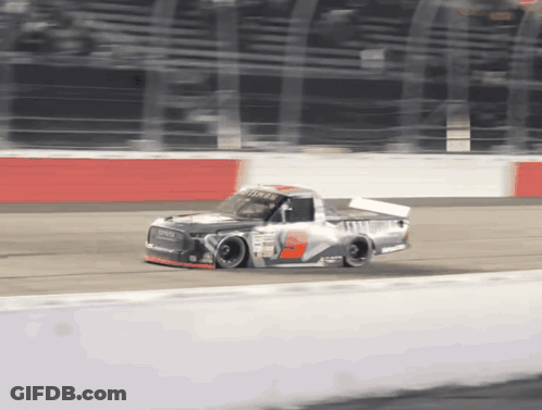 A Race Car With The Word Toyota On The Front GIF