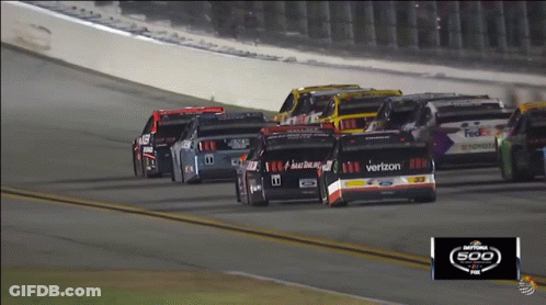A Race Car With The Word Verizon On The Side GIF
