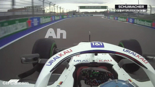 A Race Car With Uralkali Written On The Side Of It GIF