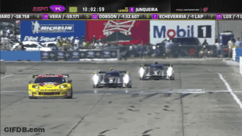 A Race Is Being Shown On Espn With A Banner For Mobil 1 In The Background GIF