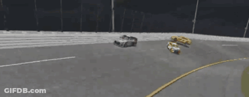 A Race Track With A Rolex Sign On The Side Of It GIF
