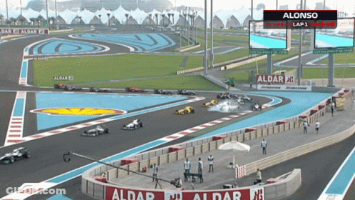 A Race Track With A Sign That Says ' Alonso Lap 1 ' On It GIF