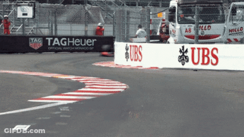 A Race Track With A Sign That Says Tag Heuer On It GIF