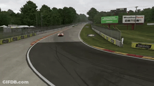 A Race Track With A Sign That Says Weather Tech GIF