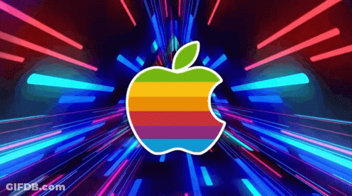 A Rainbow Apple Logo Is Surrounded By Glowing Lights GIF